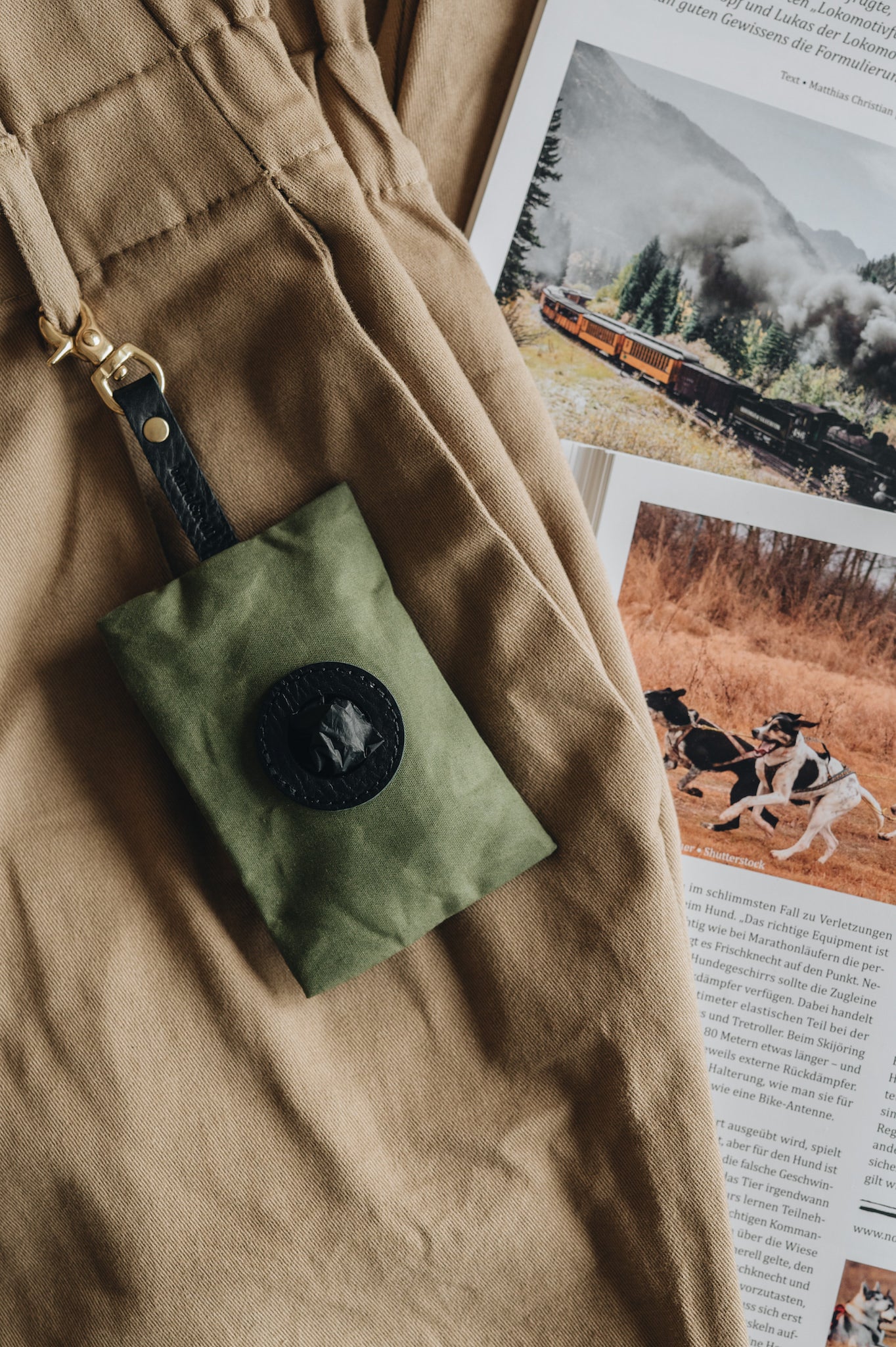 DOG POOP BAG HOLDER. NOI